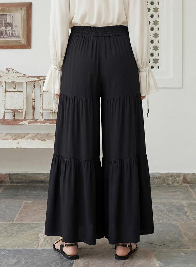 جلو باص بنطال بالازو أسود متعدد الطبقات بخصر برباط وحافة واسعة - Image 3